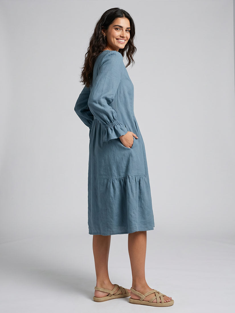 altair linen midi dress in saltwatear from Ancora by get dressed collective on dark haired woman