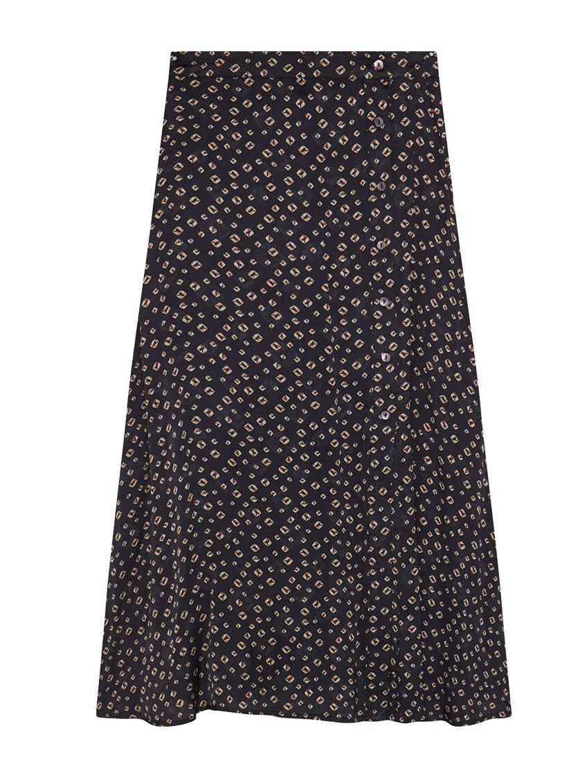 flat lay of black print tana skirt skirt