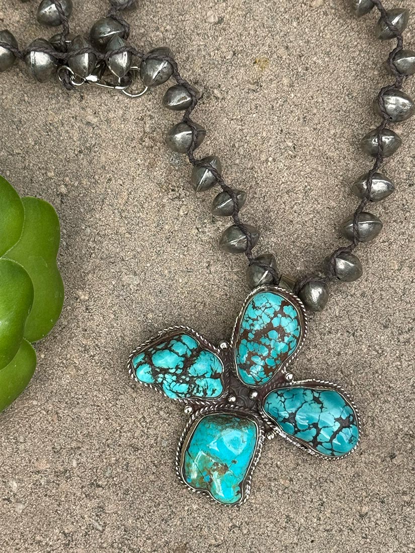 devine path turquoise pendant necklace close up