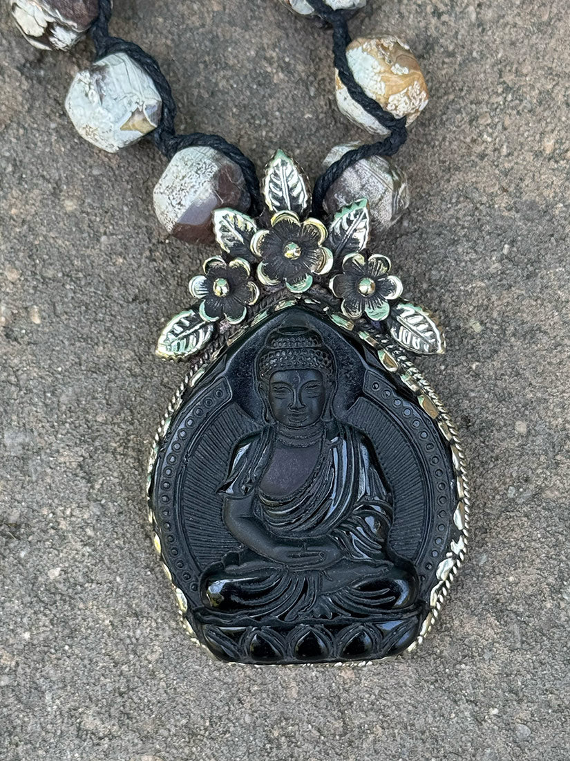 silver buddha necklace from tara gasparian