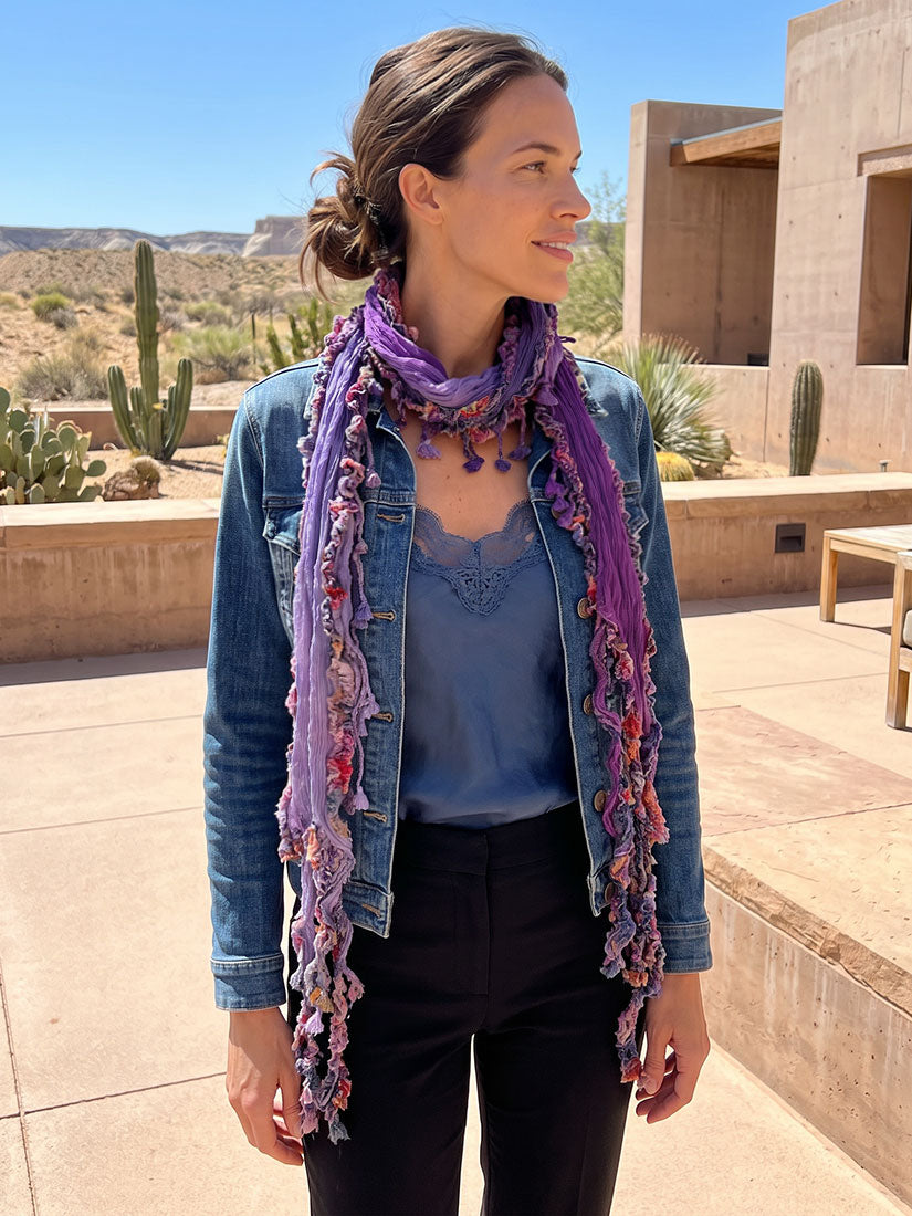 woman in the desert wearing denim jacket and monkey mango violet scarf