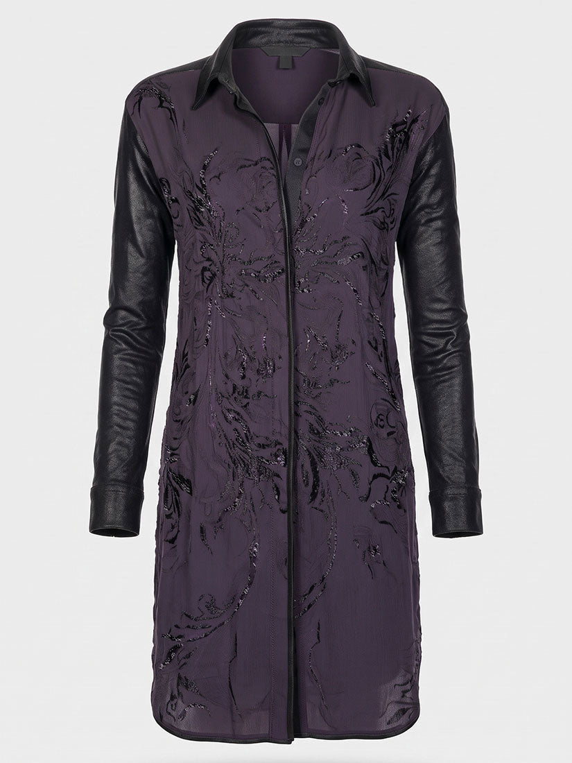 A dark purple long-sleeve shirt jacket with black leather sleeves and black floral embroidery, shown against a light gray background.