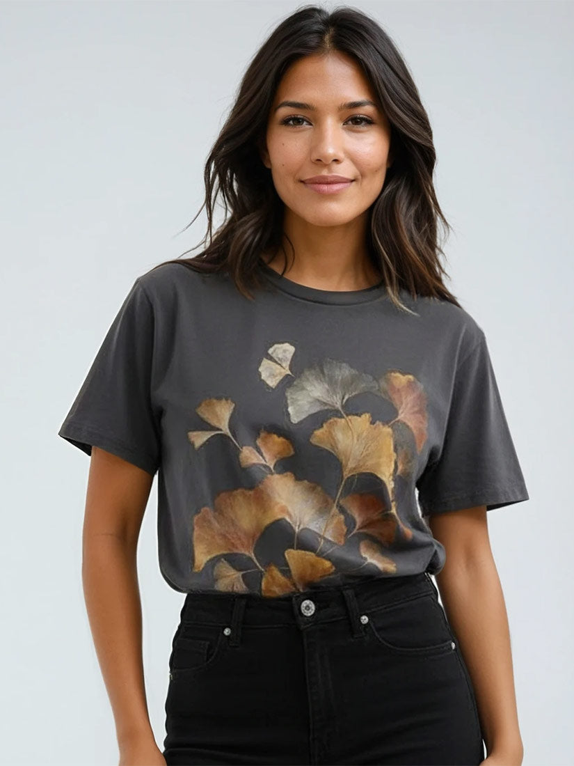 ancient leaves graphic tee from get dressed collective on brown hair model