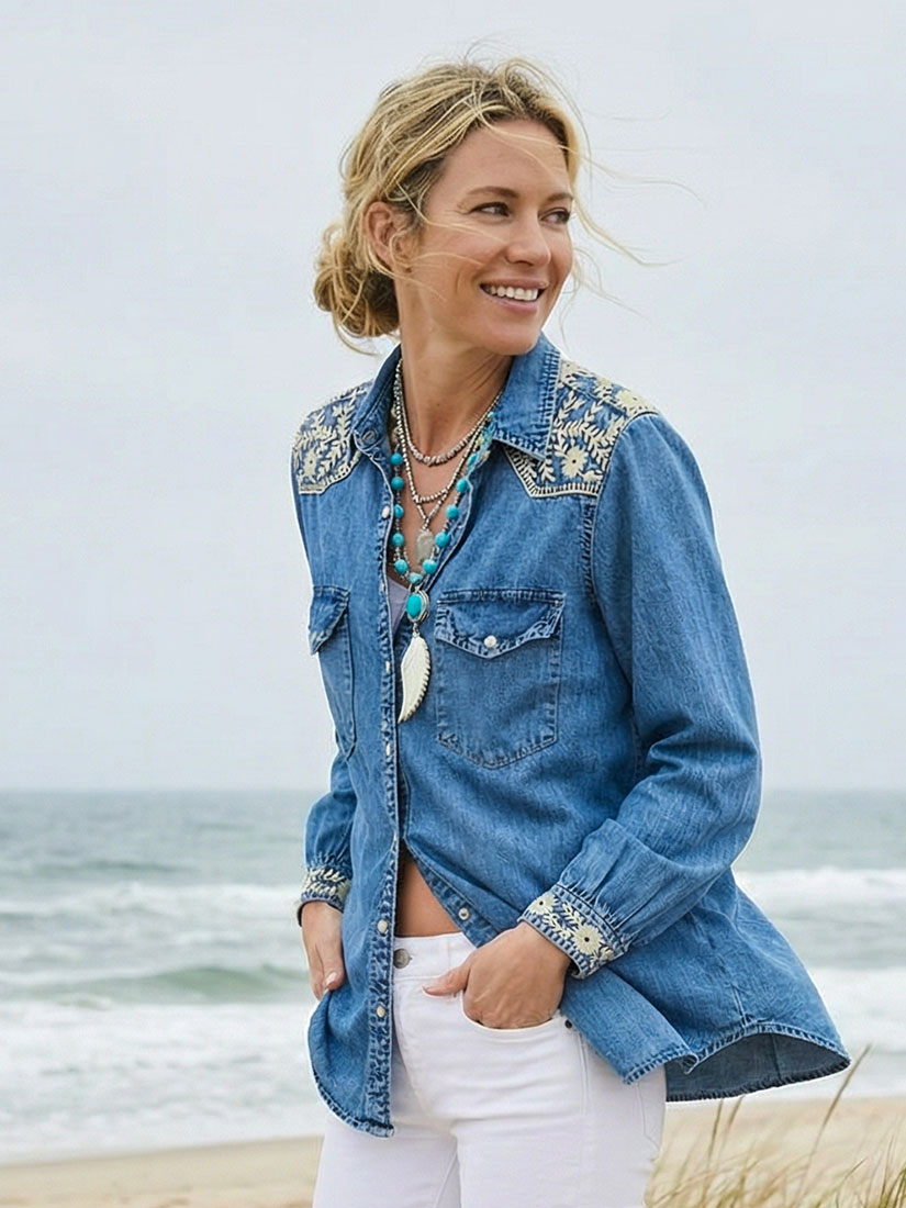 thelma embroidered denim shirt lifestyle on beach from maison hotel