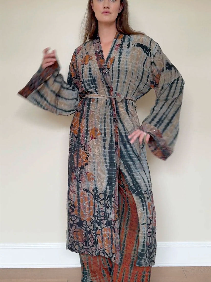 blond haired woman in vintage sequin kimono