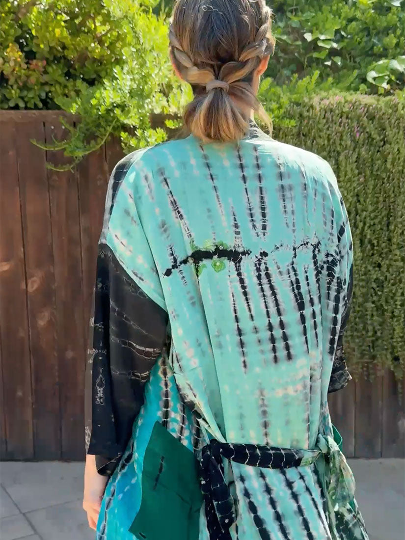blonde haired woman in turquoise vintage silk kimono