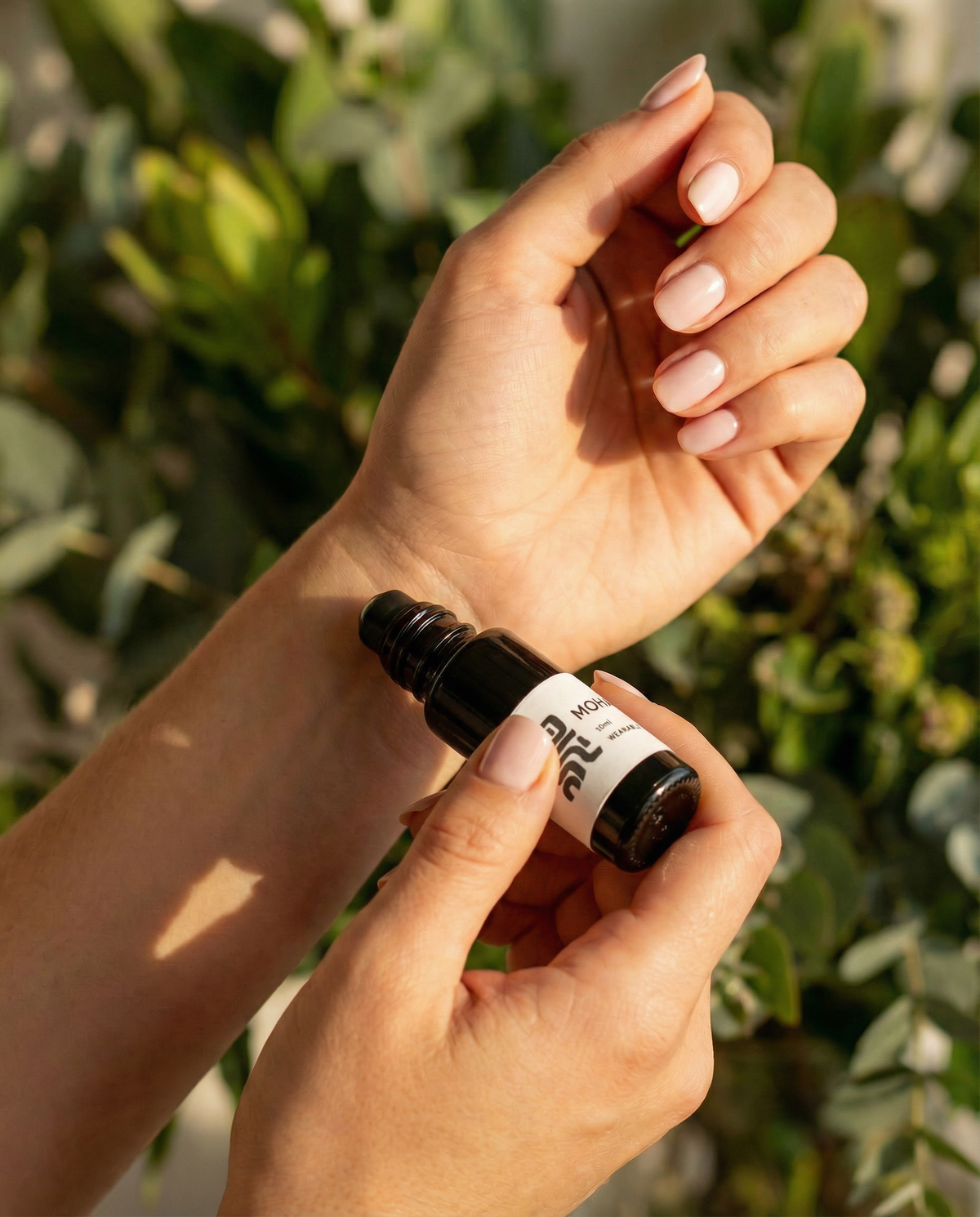 wilkin and may roll on scent with hand and wrist